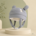 Little Explorer Baby Head Protection Helmet in grey — bear ear design studio shot